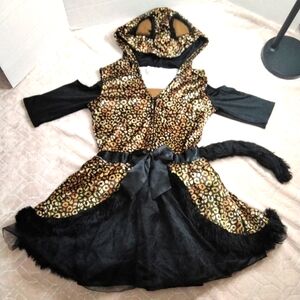 Child XL cat halloween costume with cut out shoulder detail and removable tail